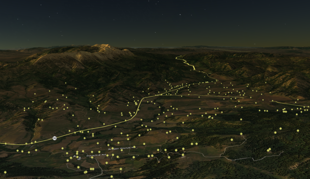Bridger Canyon in the evening, as simulated by Google Earth. Each glowing orb represents a single light on an existing structure.